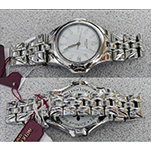 Michel BECKER - Design de la montre SCULPTURE de PATEK-PHILIPPE - Modèle homme tout acier vue recto-verso avec labels de garantie